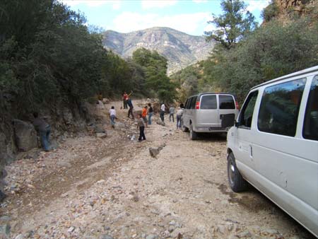 Re-building the road into Turkey Creek, north of Gila, New Mexico, 2006, photograph by Tanisa Sharif